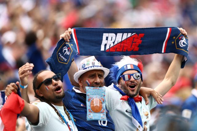 French fans show a scarf of their team ahead of the 2026 World Cup Group I football match between Norway and France at the Boston Stadium in Foxborough on June 26, 2026.  (Photo by CHARLY TRIBALLEAU / AFP)