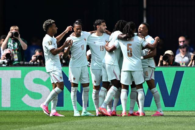 France's forward #07 Ousmane Dembele (unmseen) celebrates with teammates scoring his team's first goal during the 2026 World Cup Group I football match between Norway and France at the Boston Stadium in Foxborough on June 26, 2026.  (Photo by Jewel SAMAD / AFP)