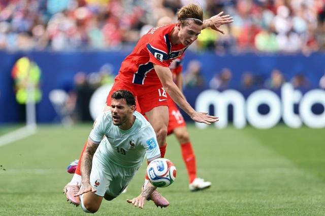 France's defender #19 Theo Hernandez is fouled by Norway's midfielder #18 Kristian Thorstvedt during the 2026 World Cup Group I football match between Norway and France at the Boston Stadium in Foxborough on June 26, 2026.  (Photo by CHARLY TRIBALLEAU / AFP)