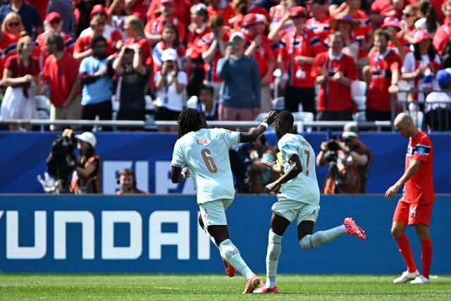 France's forward #07 Ousmane Dembele celebrates with teammate midfielder #06 Manu Kone scoring his team's third goal during the 2026 World Cup Group I football match between Norway and France at the Boston Stadium in Foxborough on June 26, 2026.  (Photo by Jewel SAMAD / AFP)