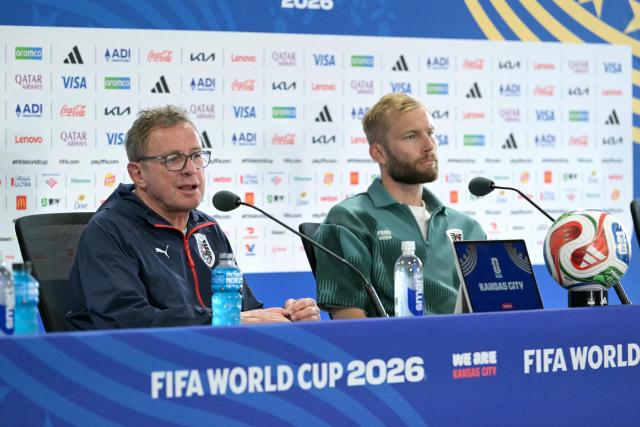 Austria's German head coach Ralf Rangnick (L) and midfielder #20 Konrad Laimer (R) give an MD-1 press conference at the Kansas City Stadium in Kansas City on June 26, 2026, on the eve of the 2026 World Cup Group J football match between Algeria and Austria.  (Photo by JUAN MABROMATA / AFP)