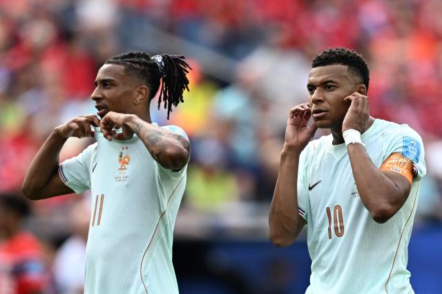 France's forward #11 Michael Olise France's forward #10 Kylian Mbappe gesture the 2026 World Cup Group I football match between Norway and France at the Boston Stadium in Foxborough on June 26, 2026.  (Photo by Jewel SAMAD / AFP)