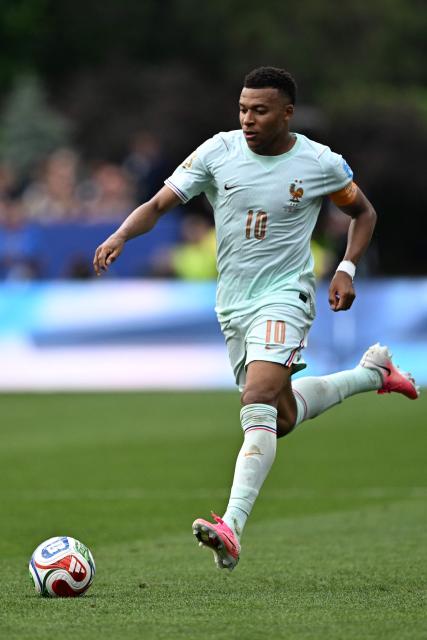 France's forward #10 Kylian Mbappe controls the ball during the 2026 World Cup Group I football match between Norway and France at the Boston Stadium in Foxborough on June 26, 2026.  (Photo by Jewel SAMAD / AFP)