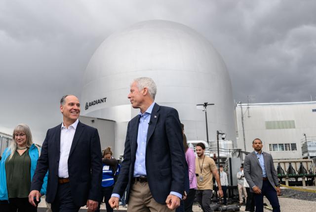 US Secretary of Energy Chris Wright (R) speaks with The director of Idaho National Laboratory John Wagner during a tour of the Idaho National Laboratory in an area west of Idaho Falls, Idaho, on June 25, 2026. Wright visited various sites where companies have been racing to build small modular nuclear reactors in what has been heralded as Americas nuclear renaissance. Several next-generation small nuclear reactors, widely seen as the future of the sector, are now operational or close to becoming so in the United States -- a major milestone made possible by an influx of private capital and support from the American government. The milestone was put on display in the middle of the Idaho dessert where a cluster of drab hangars might otherwise go unnoticed. (Photo by Josh Edelson / AFP)