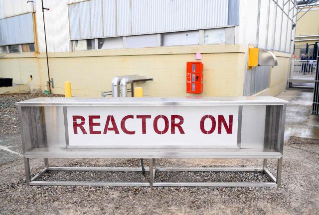 A sign indicating reactor status is seen during a tour with US Secretary of Energy Chris Wright at the Idaho National Laboratory in an area west of Idaho Falls, Idaho, on June 25, 2026. Wright visited various sites where companies have been racing to build small modular nuclear reactors in what has been heralded as Americas nuclear renaissance. Several next-generation small nuclear reactors, widely seen as the future of the sector, are now operational or close to becoming so in the United States -- a major milestone made possible by an influx of private capital and support from the American government. The milestone was put on display in the middle of the Idaho dessert where a cluster of drab hangars might otherwise go unnoticed. (Photo by Josh Edelson / AFP)