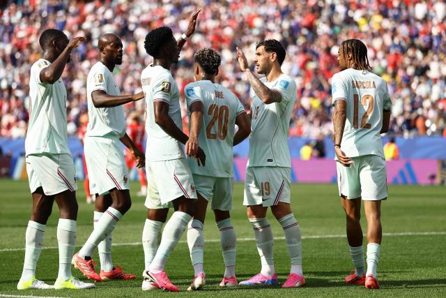 France's forward #20 Desire Doue celebrates with teammates scoring his team's fourth goal during the 2026 World Cup Group I football match between Norway and France at the Boston Stadium in Foxborough on June 26, 2026.  (Photo by CHARLY TRIBALLEAU / AFP)