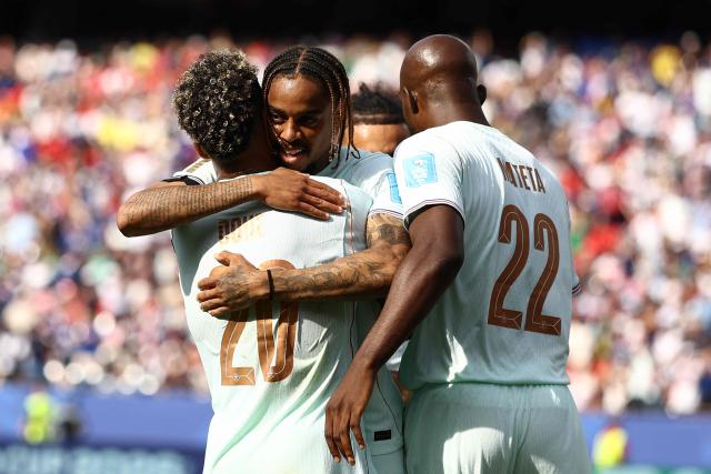 France's forward #20 Desire Doue celebrates with teammates scoring his team's fourth goal during the 2026 World Cup Group I football match between Norway and France at the Boston Stadium in Foxborough on June 26, 2026.  (Photo by CHARLY TRIBALLEAU / AFP)