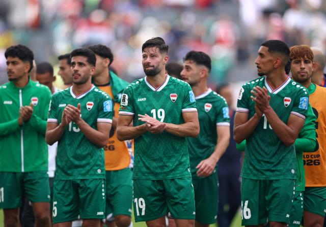 Iraq's players greet fans after losing the 2026 World Cup Group I football match between Senegal and Iraq at the Toronto Stadium in Toronto on June 26, 2026.  (Photo by Cole Burston / AFP)