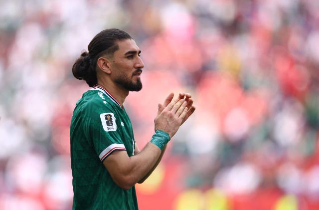 Iraq's defender #05 Hashim Akam Rahman greets fans after losing the 2026 World Cup Group I football match between Senegal and Iraq at the Toronto Stadium in Toronto on June 26, 2026.  (Photo by Cole Burston / AFP)