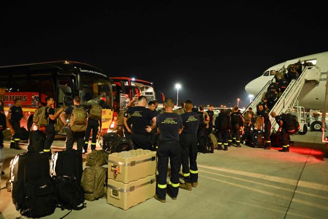 French officers of the 7e Régiment d'Instruction et d'Intervention de la Sécurité Civile (7e RIISC - The 7th Civil Security Training and Response Regiment) prepare their shipment before flying to Venezuela to provide help after two earthquakes hit the country, at the Marseille Provence Airport in Marignane, southern France, on June 27, 2026. The death toll from two powerful earthquakes that devastated Venezuela earlier this week rose to 920 on June 26, National Assembly President Jorge Rodriguez said. (Photo by Miguel MEDINA / AFP)