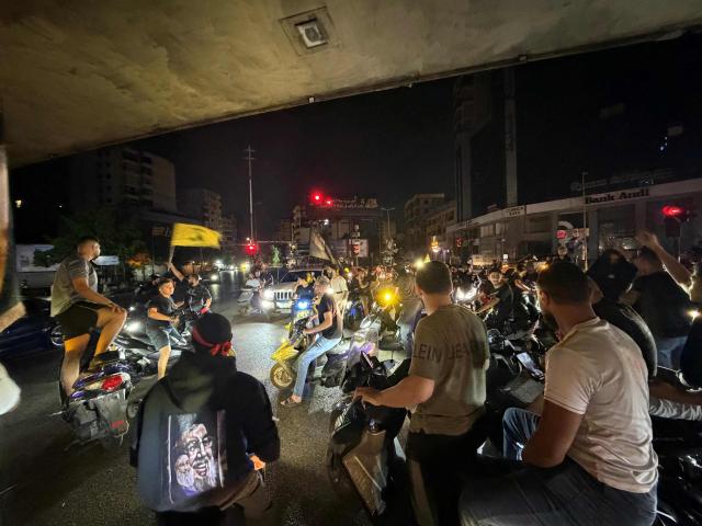Hezbollah supporters take to the streets in the southern suburbs of Beirut to protest against the trilateral agreement that was signed between the US, Israel and Lebanon on June 27, 2026. (Photo by Ibrahim AMRO / AFP)