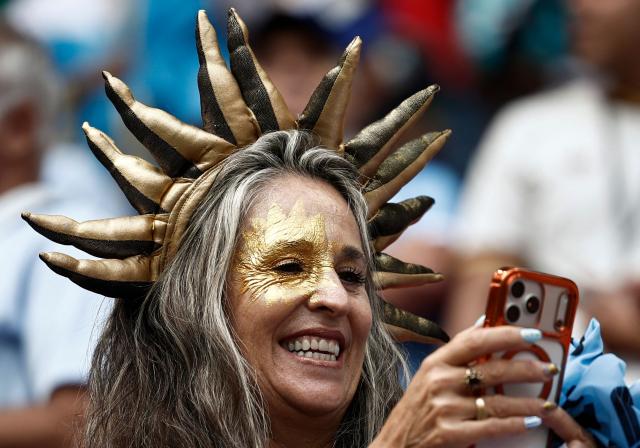 An Uruguayan fan takes pictures ahead of the 2026 World Cup Group H football match between Uruguay and Spain at the Guadalajara Stadium in Zapopan on June 26, 2026.  (Photo by Ulises RUIZ / AFP)