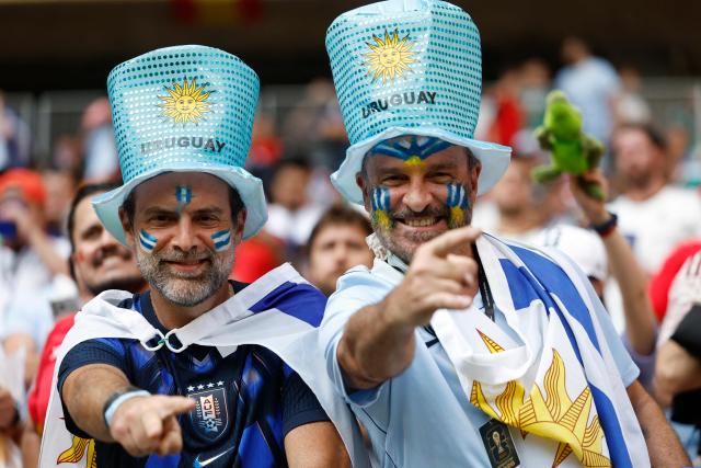 Uruguayan fans cheer ahead of the 2026 World Cup Group H football match between Uruguay and Spain at the Guadalajara Stadium in Zapopan on June 26, 2026.  (Photo by Ulises RUIZ / AFP)