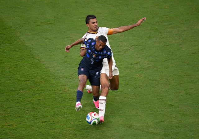 Uruguay's midfielder #07 Nicolas de la Cruz and Spain's midfielder #16 Rodri fight for the ball during the 2026 World Cup Group H football match between Uruguay and Spain at the Guadalajara Stadium in Zapopan on June 26, 2026.  (Photo by Alfredo ESTRELLA / AFP)