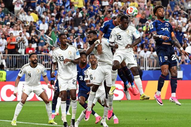 Cape Verde's forward #20 Ryan Mendes (R) jumps to head the ball during the 2026 World Cup Group H football match between Cape Verde and Saudi Arabia at the Houston Stadium in Houston on June 26, 2026.  (Photo by RONALDO SCHEMIDT / AFP)