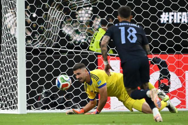 Spain's goalkeeper #23 Unai Simon eyes the ball during the 2026 World Cup Group H football match between Uruguay and Spain at the Guadalajara Stadium in Zapopan on June 26, 2026.  (Photo by CARL DE SOUZA / AFP)