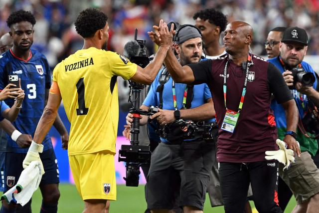 Cape Verde's goalkeeper #01 Vozinha (L) celebrates after the 2026 World Cup Group H football match between Cape Verde and Saudi Arabia at the Houston Stadium in Houston on June 26, 2026.  (Photo by RONALDO SCHEMIDT / AFP)