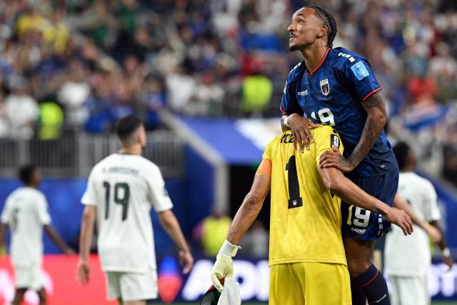 Cape Verde's goalkeeper #01 Vozinha (L) celebrates with Cape Verde's forward #19 Dailon Livramento after the 2026 World Cup Group H football match between Cape Verde and Saudi Arabia at the Houston Stadium in Houston on June 26, 2026.  (Photo by RONALDO SCHEMIDT / AFP)