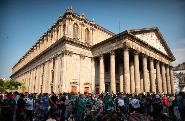 Fans watch the 2026 World Cup Group H football match between Uruguay and Spain on a giant screen at the FIFA Fan Festival, held at Plaza de la Liberacion and Plaza de Armas, in Guadalajara, Mexico, on June 26, 2026. (Photo by RUTH ROSAS / AFP)