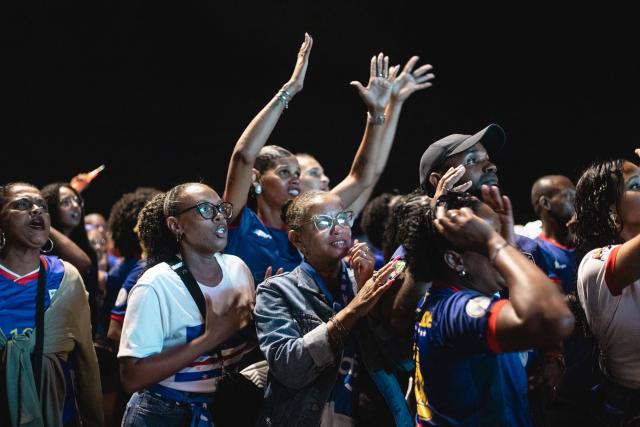 Supporters of Cape Verde's national football team react as they watch the 2026 World Cup football tournament match between Cape Verde and Saudi Arabia in Mindelo, on June 26, 2026. (Photo by Queila Fernandes / AFP)