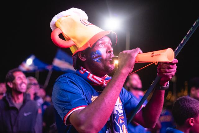A supporter of Cape Verde's national football team celebrates after his team qualified for the knockout stage of the 2026 World Cup in Mindelo, on June 27, 2026. (Photo by Queila Fernandes / AFP)