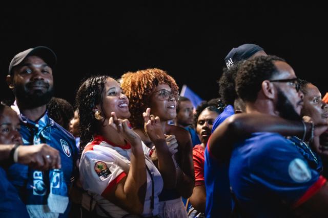 Supporters of Cape Verde's national football team react as they watch the 2026 World Cup football tournament match between Cape Verde and Saudi Arabia in Mindelo, on June 26, 2026. (Photo by Queila Fernandes / AFP)