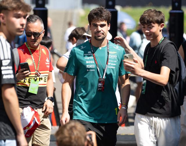 Aston Martin's Canadian driver Lance Stroll walks in the paddock prior to the third practice session at the Red Bull Ring race track in Spielberg, Austria on June 27, 2026, ahead of the Formula One Austrian Grand Prix. (Photo by Joe KLAMAR / AFP)