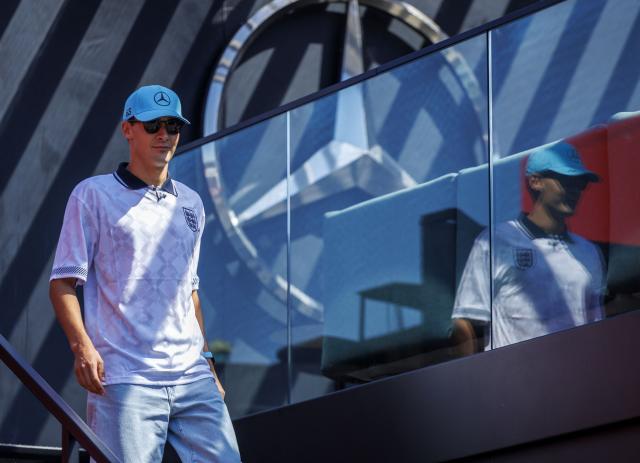 Mercedes' British driver George Russell walks in the paddock prior to the third practice session at the Red Bull Ring race track in Spielberg, Austria on June 27, 2026, ahead of the Formula One Austrian Grand Prix. (Photo by ERWIN SCHERIAU / APA / AFP) / Austria OUT