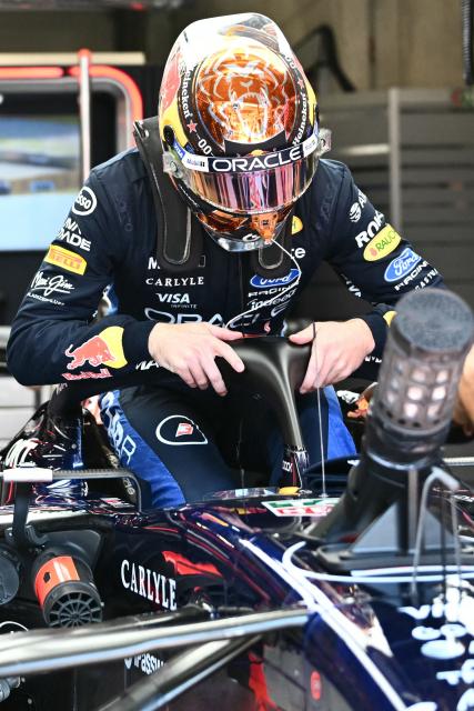 Red Bull Racing's Dutch driver Max Verstappen gets in his car prior to the qualifying session at the Red Bull Ring race track in Spielberg, Austria on June 27, 2026, ahead of the Formula One Austrian Grand Prix. (Photo by Joe Klamar / AFP)