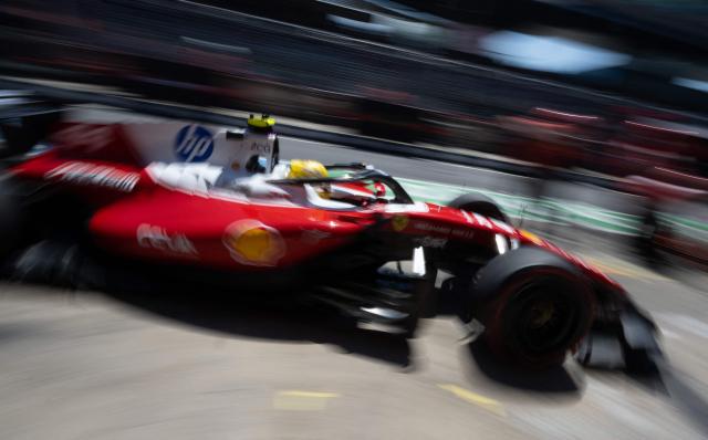 Ferrari's British driver Lewis Hamilton arrives in the pit during the third practice session at the Red Bull Ring race track in Spielberg, Austria on June 27, 2026, ahead of the Formula One Austrian Grand Prix. (Photo by Joe KLAMAR / AFP)