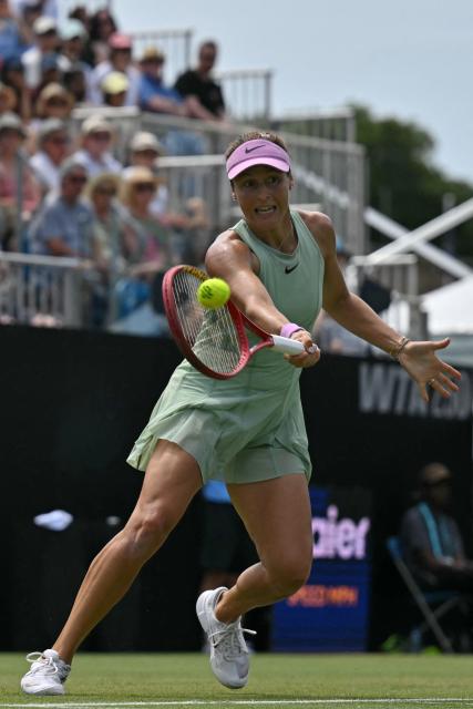 Germany's Tatjana Maria returns against US player Madison Keys during their women's final tennis match on day six of the Lexus Eastbourne Open at Devonshire Park, Eastbourne, on the south coast of England on June 27, 2026. (Photo by Glyn KIRK / AFP)