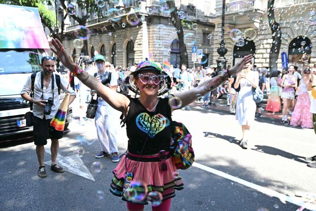 Participants gather to the Budapest Pride Parade in Budapest, Hungary on June 27, 2026. (Photo by Attila KISBENEDEK / AFP)
