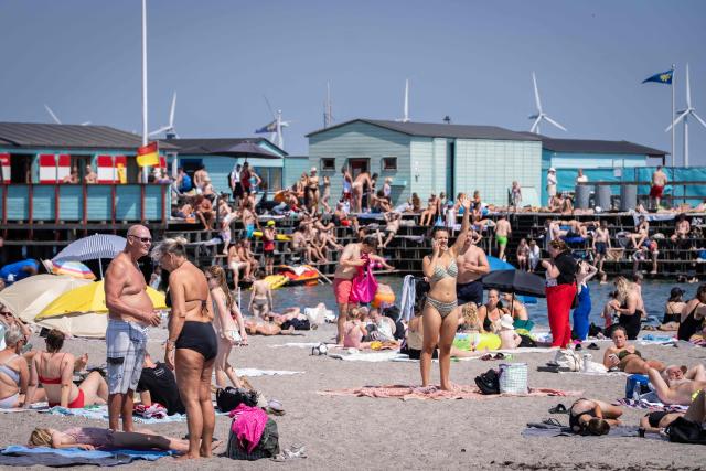 People cool off at Amager Beach in Copenhagen, Denmark on June 27, 2026. Denmark recorded its highest temperature on record on June 27, 2026, the Danish Meteorological Institute (DMI) said.
"With 36.6C north of Odense, we have the warmest day ever since measurements began in 1874," DMI said in a post to X. (Photo by Emil Nicolai Helms / Ritzau Scanpix / AFP) / Denmark OUT