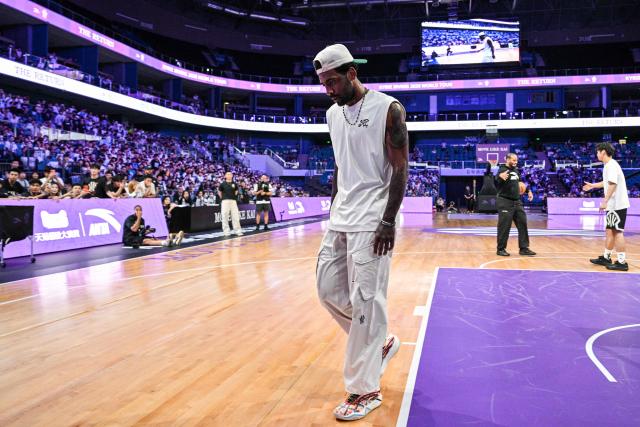 USA's basketball player Kyrie Irving is seen in an event with fans during his World Tour with the Chinese brand ANTA titled "The Return" in Chengdu, in China's southwestern Sichuan province on June 27, 2026. (Photo by Hector RETAMAL / AFP)