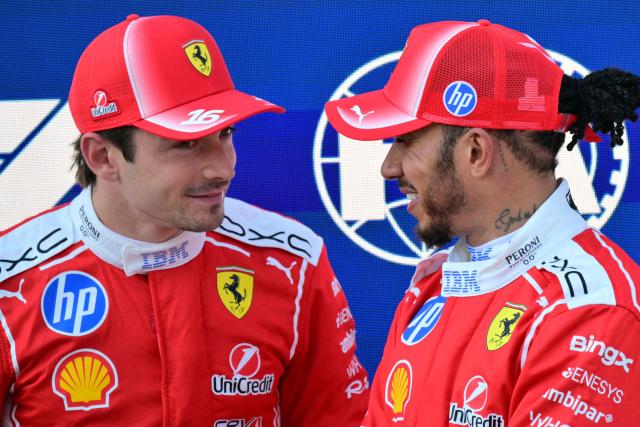 Ferrari's British driver Lewis Hamilton chats with Ferrari's Monegasque driver Charles Leclerc after the qualifying session at the Red Bull Ring race track in Spielberg, Austria on June 27, 2026, ahead of the Formula One Austrian Grand Prix. (Photo by Andrej ISAKOVIC / AFP)