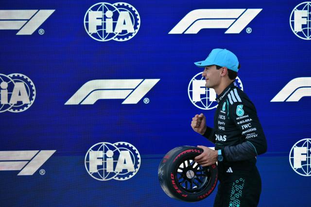 Mercedes' British driver George Russell celebrates after taking the pole position after the qualifying session at the Red Bull Ring race track in Spielberg, Austria on June 27, 2026, ahead of the Formula One Austrian Grand Prix. (Photo by Andrej ISAKOVIC / AFP)