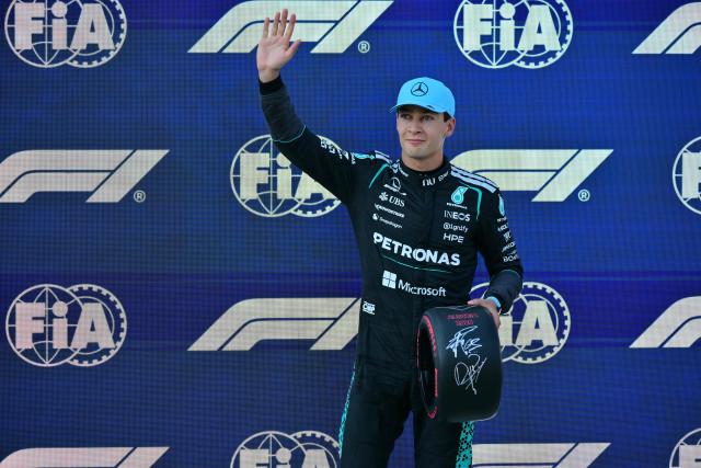 Pole position winner Mercedes' British driver George Russell poses with the pole position award after the qualifying session at the Red Bull Ring race track in Spielberg, Austria on June 27, 2026, ahead of the Formula One Austrian Grand Prix. (Photo by Andrej ISAKOVIC / AFP)
