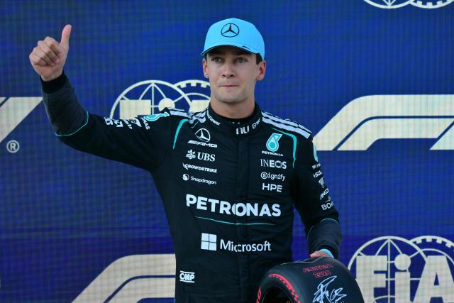 Pole position winner Mercedes' British driver George Russell poses with the pole position award after the qualifying session at the Red Bull Ring race track in Spielberg, Austria on June 27, 2026, ahead of the Formula One Austrian Grand Prix. (Photo by Andrej ISAKOVIC / AFP)