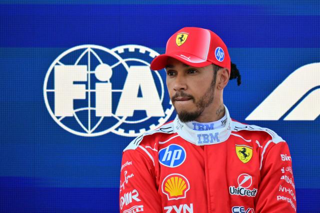 Ferrari's British driver Lewis Hamilton poses during the pole position ceremony following the qualifying session at the Red Bull Ring race track in Spielberg, Austria on June 27, 2026, ahead of the Formula One Austrian Grand Prix. (Photo by Andrej ISAKOVIC / AFP)