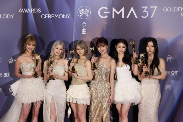 Taiwanese girls group GENBLUE poses after winning the Best Vocal Group at the 37th Golden Melody Awards ceremony at Taipei Arena in Taipei on June 27, 2026. (Photo by I-Hwa Cheng / AFP)