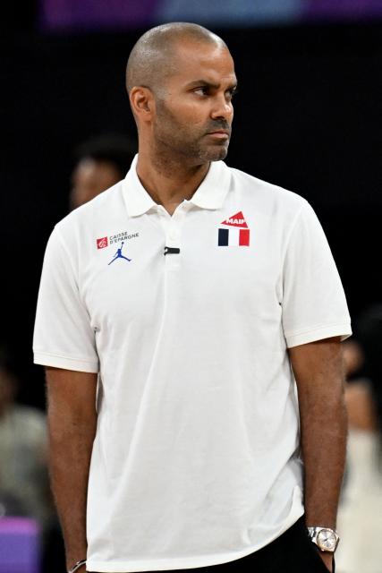 France's U17 national basketball head coach Tony Parker looks on before the start of the U17 Basketball World Cup group match between France and USA in Istanbul on June 27, 2026. (Photo by Ozan KOSE / AFP)