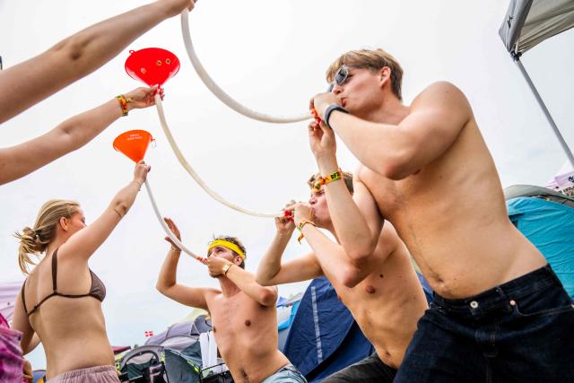 Camp Gemmeleg competes for a spot in the top three of the beer bong competition as the camping area opens at the Roskilde Festival, on June 27, 2026, ahead of the July 1st start of the Roskilde Festival. Denmark recorded its highest temperature on record on June 27, 2026, the Danish Meteorological Institute (DMI) said.
"With 36.6C north of Odense, we have the warmest day ever since measurements began in 1874," DMI said in a post to X. (Photo by Ida Marie Odgaard / Ritzau Scanpix / AFP) / Denmark OUT