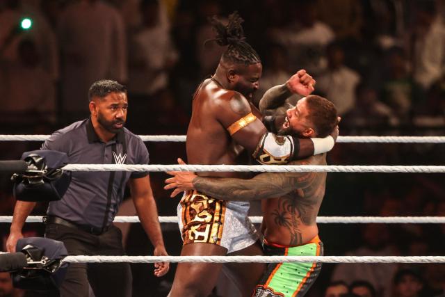 Nigerian wrestler Oba Femi (L) and US wrestler Jey Uso fight during the WWE Night of Champions wrestling event in Riyadh on June 27, 2026. (Photo by Fayez NURELDINE / AFP)
