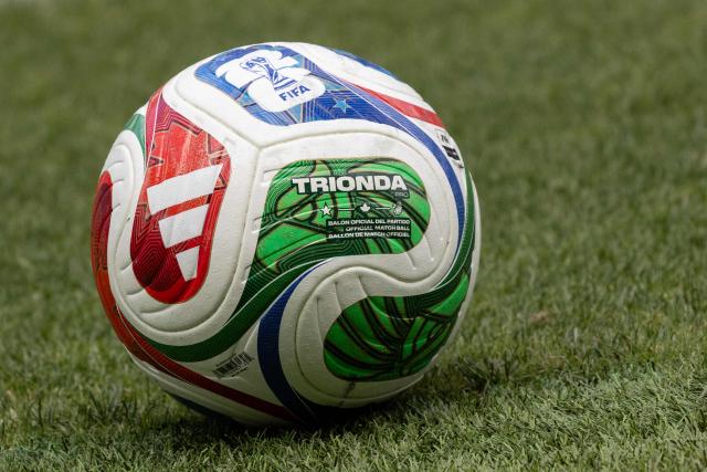 A photo shows an official competition ball on the pitch prior to an MD-1 training session at Carson Sports Park in Carson on June 27, 2026, on the eve of the 2026 World Cup round of 32 football match between South Africa and Canada at the Los Angeles Stadium in Inglewood. (Photo by ETIENNE LAURENT / AFP)