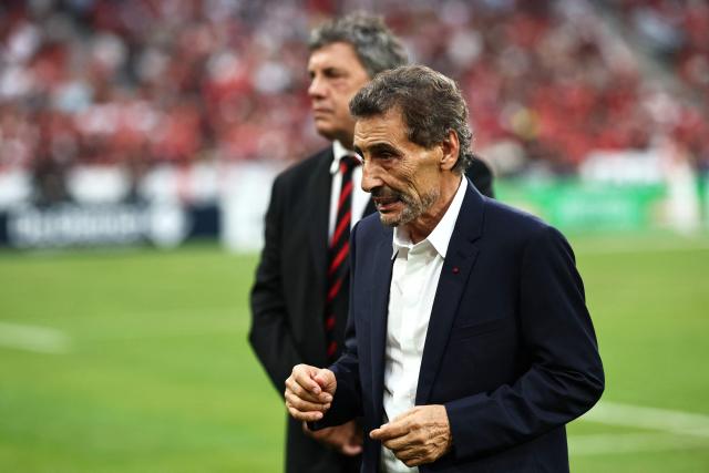 French-Syrian businessman and President of Montpellier Hérault Rugby Mohed Altrad walks on the pitch prior to the French Top 14 rugby union final between Stade Toulousain (Toulouse) and Montpellier Hérault Rugby (MHR) at the Stade de France in Saint-Denis, on the outskirst of Paris, on June 27, 2026. (Photo by Anne-Christine POUJOULAT / AFP)