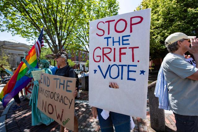 People participate in the "All of US" demonstration in Portsmouth, New Hampshire, on June 27, 2026. Activists are conducting a nationwide response to the planned events by the administration of US President Donald Trump to mark the 250th anniversary of the United States' Declaration of Independence. (Photo by JOSEPH PREZIOSO / AFP)
