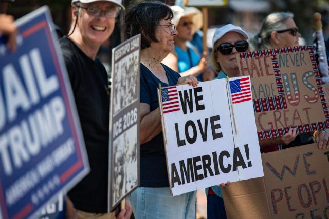 People participate in the "All of US" demonstration in Portsmouth, New Hampshire, on June 27, 2026. Activists are conducting a nationwide response to the planned events by the administration of US President Donald Trump to mark the 250th anniversary of the United States' Declaration of Independence. (Photo by JOSEPH PREZIOSO / AFP)