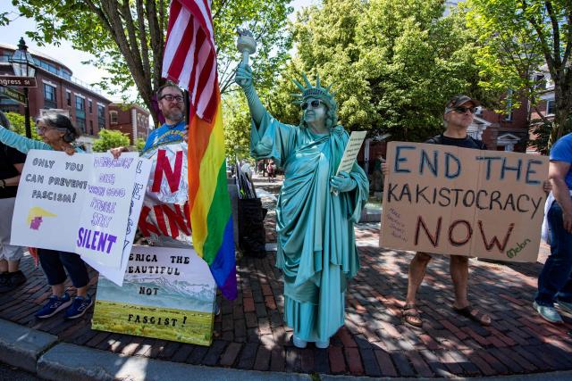 People participate in the "All of US" demonstration in Portsmouth, New Hampshire, on June 27, 2026. Activists are conducting a nationwide response to the planned events by the administration of US President Donald Trump to mark the 250th anniversary of the United States' Declaration of Independence. (Photo by JOSEPH PREZIOSO / AFP)
