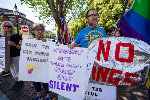 People participate in the "All of US" demonstration in Portsmouth, New Hampshire, on June 27, 2026. Activists are conducting a nationwide response to the planned events by the administration of US President Donald Trump to mark the 250th anniversary of the United States' Declaration of Independence. (Photo by JOSEPH PREZIOSO / AFP)