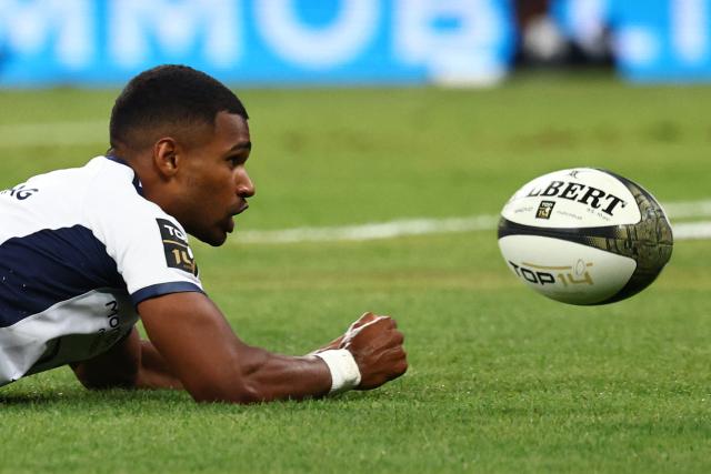 Montpellier’s French scrum?half Lйo Coly dives across the line to score a try during the French Top 14 rugby union final between Stade Toulousain (Toulouse) and Montpellier Hйrault Rugby (MHR) at the Stade de France in Saint-Denis, on the outskirts of Paris, on June 27, 2026. (Photo by Anne-Christine POUJOULAT / AFP)